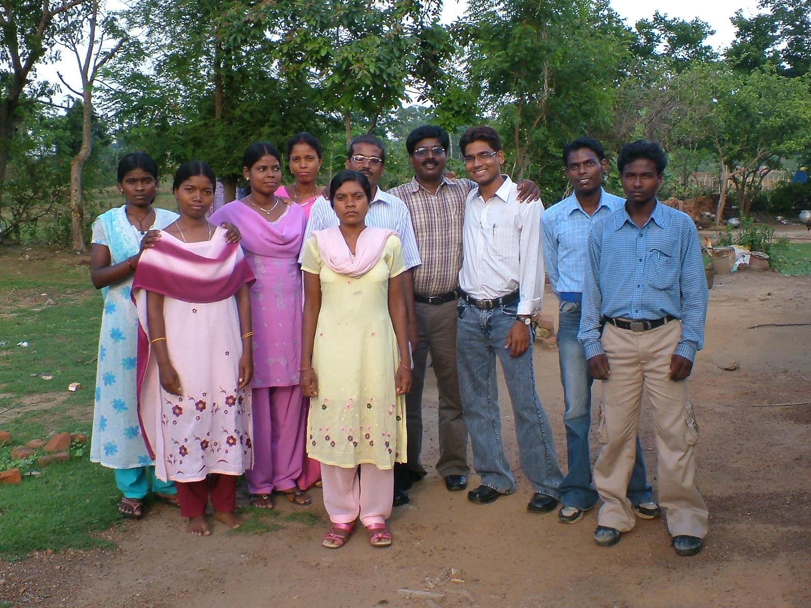 Girls receiving scholarship